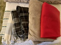 Lot of throw blankets with two heating blanket