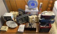 Lot of alarm clocks and wall timer electrical