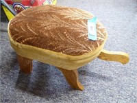 Upholstered wood turtle foot stool