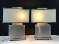 TWO MODERN METAL LAMPS WITH TEAL SHADES