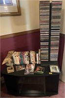 ENTERTAINMENT TV STAND WITH VHS TAPES AND