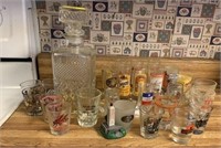 2 GLASS DECANTERS AND COLLECTION OF SHOT