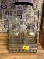 2 DECANTERS IN METAL CARRIER WITH SILVERPLATE