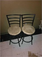 Two bar stools, seats are 24 inches tall