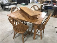 Solid Oak 48x40 Inch Table w/ 4 Chairs & 2 Leaves