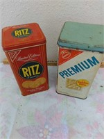 Two vintage cracker cans