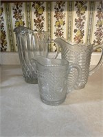 3 miscellaneous glass pitchers
