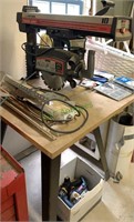 Craftsman 10 inch radial saw on a work table.