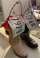 Home-made western boot bird houses with license