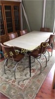 Formica table w/ 3 leaves& 6 chairs