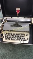 portable typwriter, brackets & briefcase