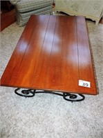 Wood and wrought iron coffee table