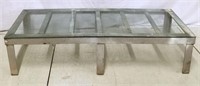 Industrial coffee table with glass top