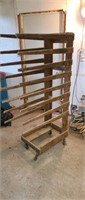 Wood dry rack on rollers 67" tall.