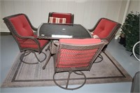 PATIO TABLE WITH 4 SWIVEL CHAIRS AND RUG