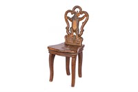 CARVED BLACK FORREST CHILD'S MUSIC CHAIR