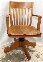 oak swivel desk arm chair