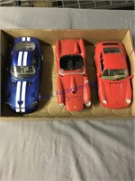 3 DIE CAST CARS--2 RED, 1 BLUE