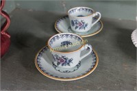 STAFFORDSHIRE HAND PAINTED CUPS AND SAUCERS