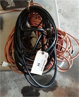Lot of Electric Chords and surge protector.