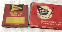 2 vintage Mopar carburetor repair kits