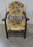 Upholstered arm chair.