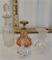 4 perfume bottles including butterfly