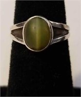 Artist signed sterling silver ring with green