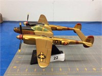 P-38 Lightning model airplane on display stand
