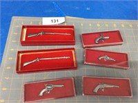 6 miniature toy guns