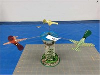 Vintage wind-up tin toy spinning airplanes
