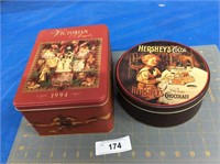 2 collectible tins with puzzles