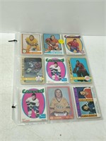 34 old hockey cards in plastic - excellent