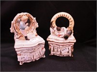 Two fairing trinket boxes 4 1/2" high, depicting