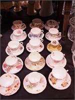 15 decorative cups and saucers including