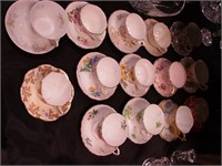 14 decorataive china cups and saucers, mostly
