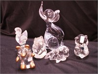 Six crystal figurines of four bears, one by