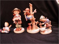 Four Hummel figurines: 4" Barnyard Hero;  6 1/2"