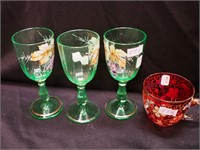 Four pieces of vintage glass decorated with