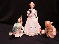 Three china figurines: Royal Doulton  "Take