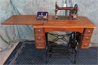 MINNESOTA MODEL B SEWING MACHINE IN CABINET