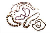 FIVE STRANDS OF ASSORTED BEADED NECKLACES