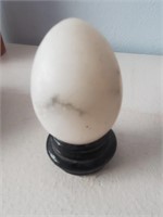 Stone Egg On Wood Stand