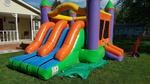 Bounce house with two lane slide