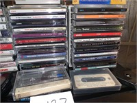A BUNCH OF CD'S AND TAPES
