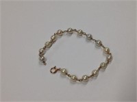 14k yellow gold Bracelet features 16 approx 6mm