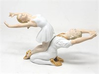 Porcelain figurine of dancers unmarked 6"×10"