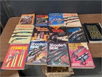 Box of gun books and book of musical notes