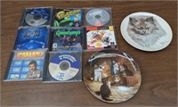 Box of CD games and collectable plates