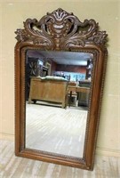 Ornately Crowned Wall Mirror.